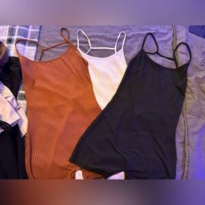 3 body suits with an open back